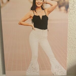 Peach Love Stretch Flare Leg White Jeans With Black Embroidered Stars  Size S